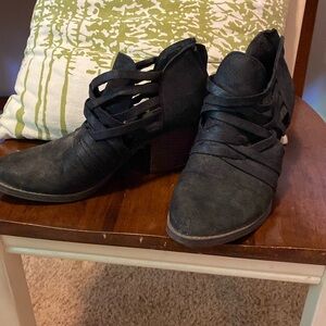 Strappy heeled wedge shoes